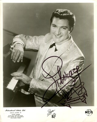 Lot 523 - LIBERACE: (1919-1987)